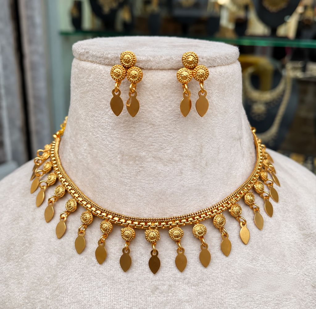 Mullamottu Elakka Thaali with matching earrings by Ore & Aura