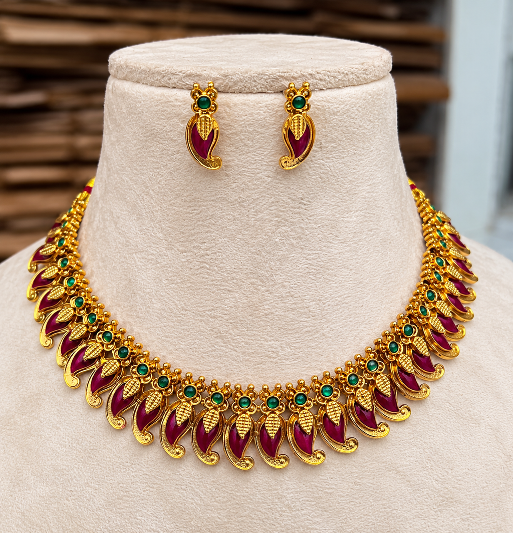 Ruby Manga Designed Palakka Necklace with matching earrings by Ore & Aura
